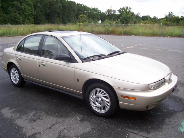 Beige Saturn sedan