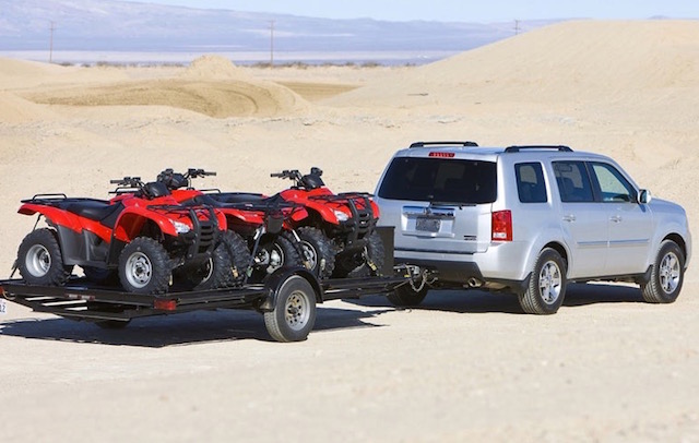 Pilot tows quads