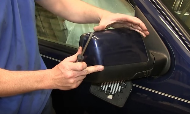 Mirror cover removal
