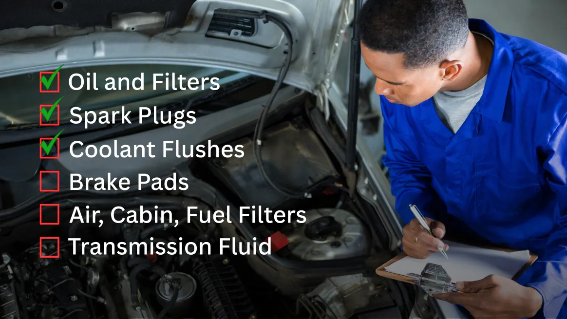 Technician Performing GM and Mopar Scheduled Maintenance Technician Performing GM and Mopar Scheduled Maintenance