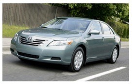 driving toyota sedan