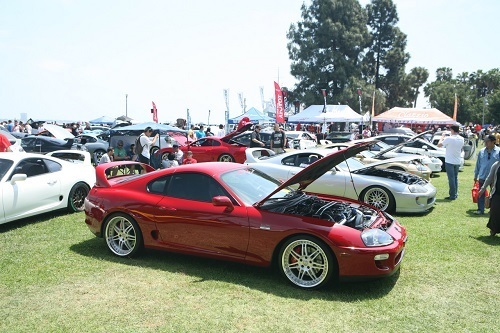 Red 4th Generation Supra with open hood 