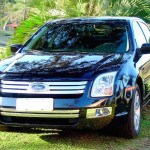 Black sedan 4dr Ford