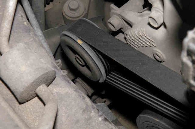 Mazda belt tensioner Mazda belt tensioner