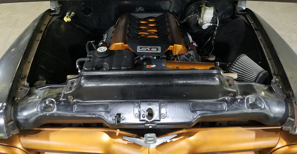 Ford F100 with a 2014 Mustang Coyote motor.