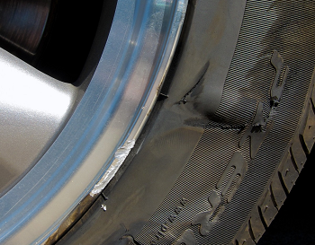 Make sure to check your tires for damage after hitting curb or other object.