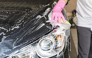 Wash and wax your car to remove road salt, dust, and mud.