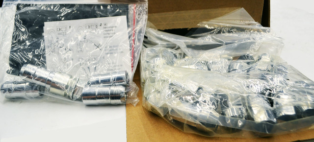 17801711 - Wheels: Wheel Lock And Nut Package, Chrome, M14 X 1.5 for Buick: Enclave | Cadillac: CTS, Escalade, Escalade ESV, Escalade EXT, SRX | Chevrolet: Avalanche, Equinox, Silverado 1500, Silverado 1500 Classic, Silverado 1500 HD Classic, Silverado 2500 HD, Silverado 2500 HD Classic, Silverado 3500 Classic, Silverado 3500 HD, Suburban, Suburban 1500, Suburban 2500, Suburban 3500 HD, Tahoe, Traverse | GMC: Acadia, Sierra 1500, Sierra 1500 Classic, Sierra 1500 HD Classic, Sierra 2500 HD, Sierra 2500 HD Classic, Sierra 3500 Classic, Sierra 3500 HD, Terrain, Yukon, Yukon XL, Yukon XL 1500, Yukon XL 2500 Image