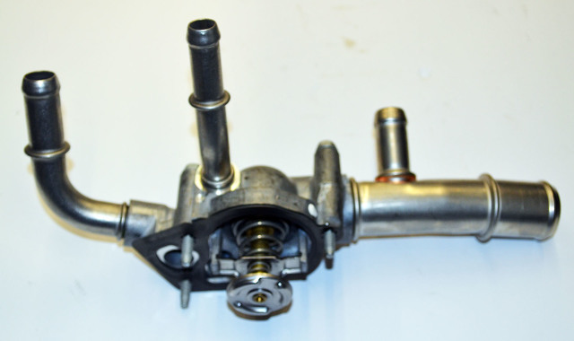 12689039 - : Engine Coolant Thermostat and Housing Assembly for Buick: LaCrosse | Cadillac: SRX, XTS | Chevrolet: Captiva Sport, Equinox, Malibu | GMC: Terrain | Pontiac: G6, Torrent | Saturn: Aura, Vue Image