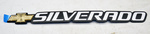 15114063 - Body: Tailgate Emblem for Chevrolet: Silverado 1500, Silverado 1500 Classic, Silverado 1500 HD, Silverado 1500 HD Classic, Silverado 2500, Silverado 2500 HD, Silverado 2500 HD Classic, Silverado 3500, Silverado 3500 Classic, Silverado 3500 HD | GMC: Sierra 1500, Sierra 1500 Classic, Sierra 1500 HD, Sierra 1500 HD Classic, Sierra 2500, Sierra 2500 HD, Sierra 2500 HD Classic, Sierra 3500, Sierra 3500 Classic, Sierra 3500 HD Image