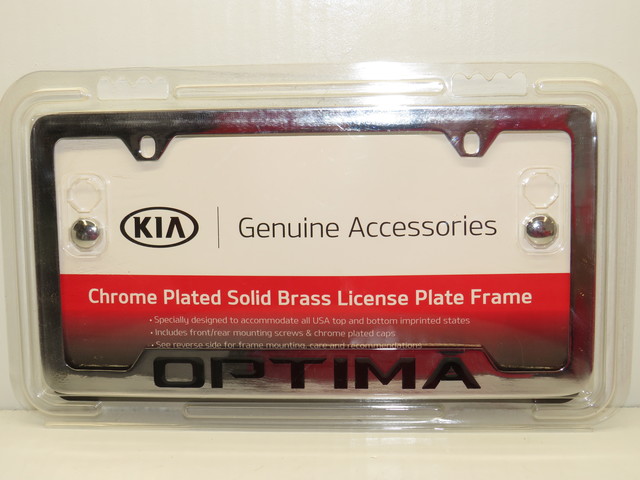 UR010AY100MG - Exterior: License Plate Frame - Lower Logo - Chrome for Kia: K5, Optima, Rio Image
