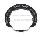 AU5Z9K072A - Fuel System: Bezel for Ford: Edge, Escape, Explorer, F-150, Fiesta, Flex, Focus, Fusion, Police Interceptor Sedan, Police Interceptor Utility, Special Service Police Sedan, Taurus | Lincoln: MKS, MKT, MKX, MKZ, Navigator | Mercury: Mariner, Milan Image