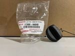7730006040 - Fuel System: Fuel Tank Cap for Scion: tC, xA, xB, xD | Toyota: 4Runner, Avalon, Camry, Corolla, FJ Cruiser, Highlander, Land Cruiser, Matrix, RAV4, Sequoia, Sienna, Solara, Tacoma, Tundra, Venza, Yaris Image