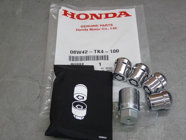 8W42TK4101 - Wheels: 2014-2025 Honda - Wheel Locks Chrome for Honda: Civic, Odyssey, Passport, Pilot, Ridgeline Image