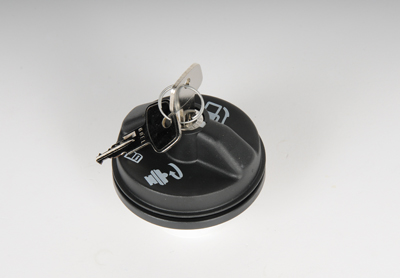 25862765 - Fuel System: Fuel Tank Cap for Buick: Century, Enclave, Rendezvous, Terraza | Cadillac: CTS, Escalade, Escalade ESV, Escalade EXT, SRX, STS | Chevrolet: Avalanche 1500, Avalanche 2500, Express 1500, Express 2500, Express 3500, Silverado 1500, Silverado 1500 Classic, Silverado 1500 HD, Silverado 2500, Silverado 2500 HD, Silverado 3500, Suburban 1500, Suburban 2500, Tahoe, Traverse, Uplander | GMC: Acadia, Savana 1500, Savana 2500, Savana 3500, Sierra 1500, Sierra 1500 Classic, Sierra 1500 HD, Sierra 2500, Sierra 2500 HD, Sierra 3500, Yukon, Yukon XL 1500, Yukon XL 2500 | Pontiac: Montana Image