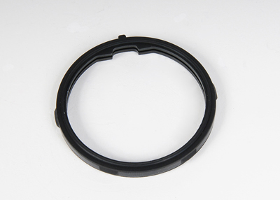 12570307 - Cooling System: Thermostat Housing Seal for Buick: LaCrosse, Rainier | Cadillac: CTS, Escalade, Escalade ESV, Escalade EXT | Chevrolet: Avalanche 1500, Avalanche 2500, Corvette, Express 1500, Express 2500, Express 3500, Impala, Monte Carlo, Silverado 1500, Silverado 1500 Classic, Silverado 1500 HD, Silverado 2500, Silverado 2500 HD, Silverado 3500, SSR, Suburban 1500, Suburban 2500, Tahoe, Trailblazer, Trailblazer EXT | GMC: Envoy, Envoy XL, Envoy XUV, Savana 1500, Savana 2500, Savana 3500, Sierra 1500, Sierra 1500 Classic, Sierra 1500 HD, Sierra 2500, Sierra 2500 HD, Sierra 3500, Yukon, Yukon XL 1500, Yukon XL 2500 | Hummer: H2 | Pontiac: G8, Grand Prix, GTO Image
