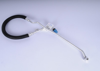 12472281 - Cooling System: Oil Cooler Pipe for Chevrolet: Blazer, C1500, C2500, C3500, K1500 Pickup, K2500 Pickup, K3500 Pickup, Suburban C2500, Suburban K2500, Tahoe | GMC: C1500 Pickup, C2500 Pickup, C3500 Pickup, K1500 Pickup, K2500 Pickup, K3500 Pickup, Suburban C2500, Suburban K2500, Yukon Image