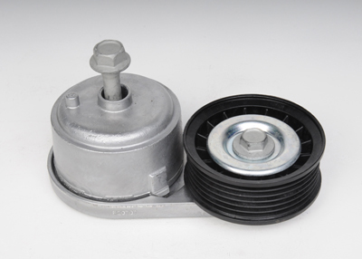 89017309 - Cooling System: Tensioner for Cadillac: Escalade | Chevrolet: Astro, Blazer, C1500, C2500, C3500, C3500HD, Express 1500, Express 2500, Express 3500, K1500 Pickup, K2500 Pickup, K3500 Pickup, P30, S10, Silverado 1500, Silverado 1500 Classic, Suburban C1500, Suburban C2500, Suburban K1500, Suburban K2500, Tahoe | GMC: C1500 Pickup, C2500 Pickup, C3500 Pickup, C3500HD, Jimmy, K1500 Pickup, K2500 Pickup, K3500 Pickup, P3500, Safari, Savana 1500, Savana 2500, Savana 3500, Sierra 1500, Sierra 1500 Classic, Sonoma, Suburban C1500, Suburban C2500, Suburban K1500, Suburban K2500, Yukon | Oldsmobile: Bravada Image