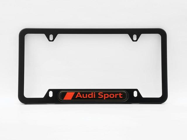 ZAW071801SDX9 - Exterior: Audi Sport License Plate Frame for Audi: A3, A3 Quattro, A3 Sportback e-tron, A4 allroad, A4 Quattro, A5 Quattro, A5 Sportback, A6 allroad, A6 Quattro, A7 Quattro, A7 Sportback, A8 Quattro, e-tron GT, e-tron Sportback, Q3, Q4 e-tron, Q5, Q5 Sportback, Q7, Q8, Q8 e-tron, R8, RS e-tron GT, RS3, RS5, RS5 Sportback, RS7, S3, S4, S5, S5 Sportback, S6, S7, S8, SQ5, SQ5 Sportback, SQ7, SQ8, SQ8 e-tron, TT Quattro, TT RS Quattro, TTS Quattro Image