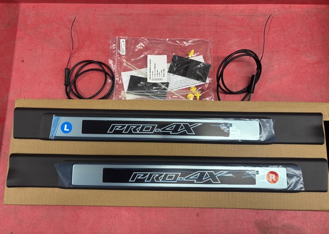 T99G69BU0P - Interior: Illuminated Kick Plates - Pro-4X Front Only for Nissan: Frontier Image