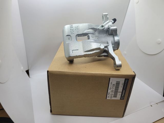 KAY0-26-71XA - Disc Brake Caliper - Driver's Side (LH) 2016-2025