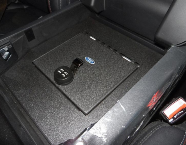 VML3Z9906202A - Interior: 2022-2023 Ford F150 Console Vault Captains Chair Vehicle Safe for Ford Image