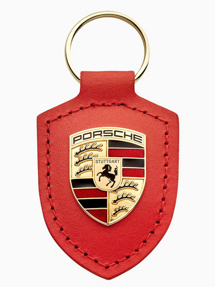 WAP0503540RWSA - : Crest Keyring 'Driven by Dreams' - 75Y - Lava Orange for Porsche Image