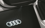 4G0052133G - : LED Puddle Lights Set - Four Rings (Narrow Plug) for Audi: A3, A3 Quattro, A3 Sportback e-tron, A4 allroad, A4 Quattro, A5 Quattro, A5 Sportback, A6 allroad, A6 Quattro, A7 Quattro, A7 Sportback, A8 Quattro, e-tron Sportback, Q3, Q4 e-tron, Q5, Q5 Sportback, Q7, Q8, Q8 e-tron, R8, RS3, RS5, RS5 Sportback, S3, S4, S5, S5 Sportback, S6, S7, SQ5, SQ5 Sportback, SQ7, SQ8, SQ8 e-tron, TT Quattro, TT RS Quattro, TTS Quattro Image