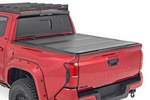 49415551 - : Hard Tri-Fold Flip Up Bed Cover | 5' Bed | Fits Toyota Tacoma 2WD/4WD (2024-2025) for Rough Country Image