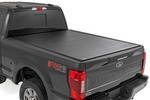 50517650 - : Hard Roll Up Bed Cover | 6'10" Bed | Ford F-250/F-350 Super Duty (17-26) for Rough Country Image