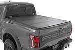 49221550 - : Hard Tri-Fold Flip Up Bed Cover | 5'7" Bed | Ford F-150 (21-25)/F-150 Lightning (22-24) for Rough Country Image