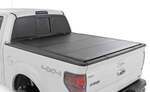 49214550 - : Hard Tri-Fold Flip Up Bed Cover | 5'7" Bed | Ford F-150 2WD/4WD (2004-2014) for Rough Country Image