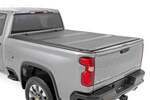 49120651 - : Hard Tri-Fold Flip Up Bed Cover | 6'9" Bed | Chevy/GMC  Silverado/Sierra 2500HD/3500HD (20-25) for Rough Country Image