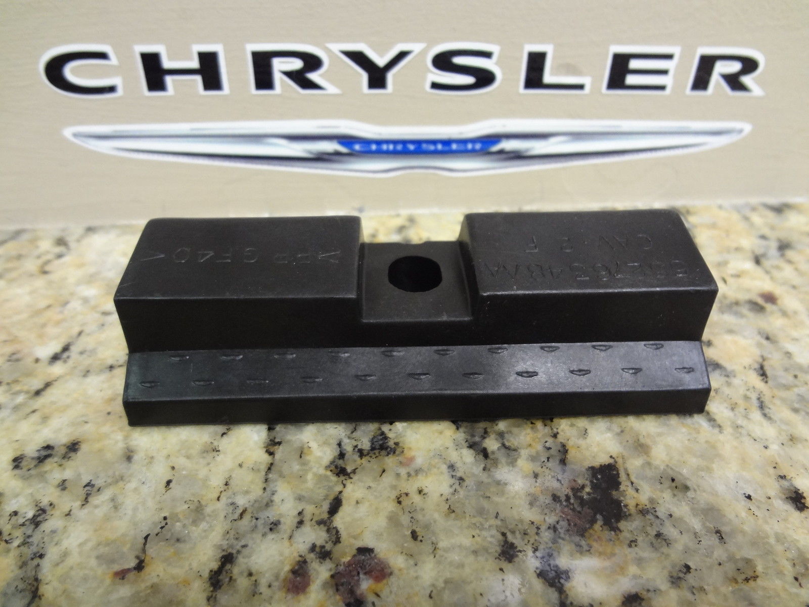 68041158AA - : Battery Hold Down Bracket for Dodge: Ram 1500, Ram 2500, Ram 3500 Image