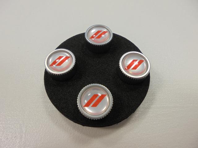 82214763AB - Exterior Accessories: Valve Stem Caps for Dodge: Charger, Charger Daytona, Durango, Hornet Image