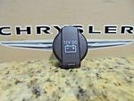 5026626AB - Interior Trim: Power Outlet Cap for Chrysler: 200, Town &amp; Country | Dodge: Avenger, Grand Caravan, Journey, Ram 1500, Ram 2500, Ram 3500 | Jeep: Commander, Grand Cherokee | Ram: 1500, 1500 Classic, 2500, 3500, C/V Image