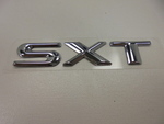 5113301AA - Exterior Ornamentation: Nameplate for Chrysler: Town &amp; Country | Dodge: Caravan, Grand Caravan Image