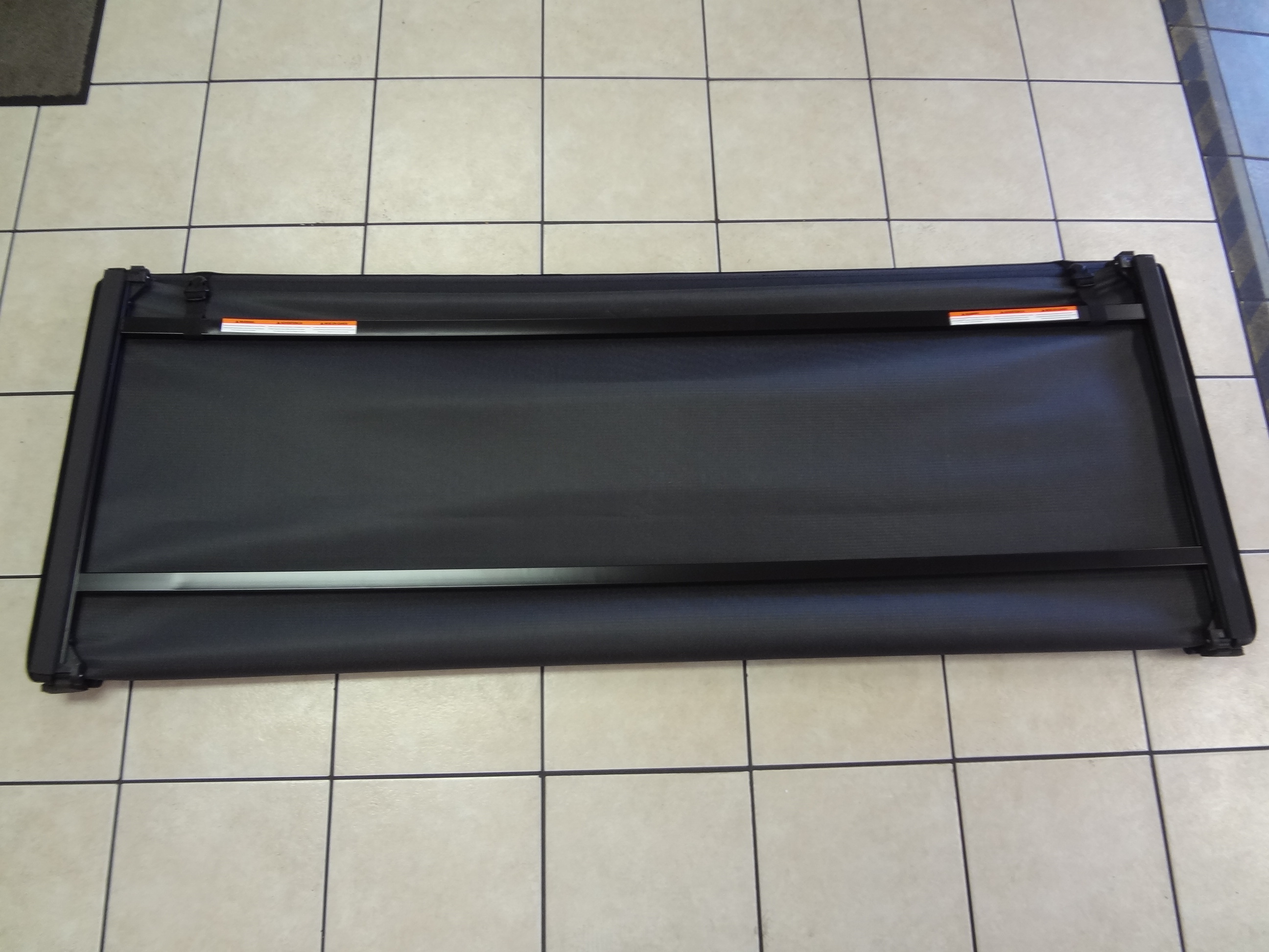 82216336AB - Exterior Accessories: Soft Tri-Fold Tonneau Cover - 6.4 Conventional Bed for Dodge: Ram 1500, Ram 2500, Ram 3500 | Ram: 1500, 1500 Classic, 2500, 3500 Image