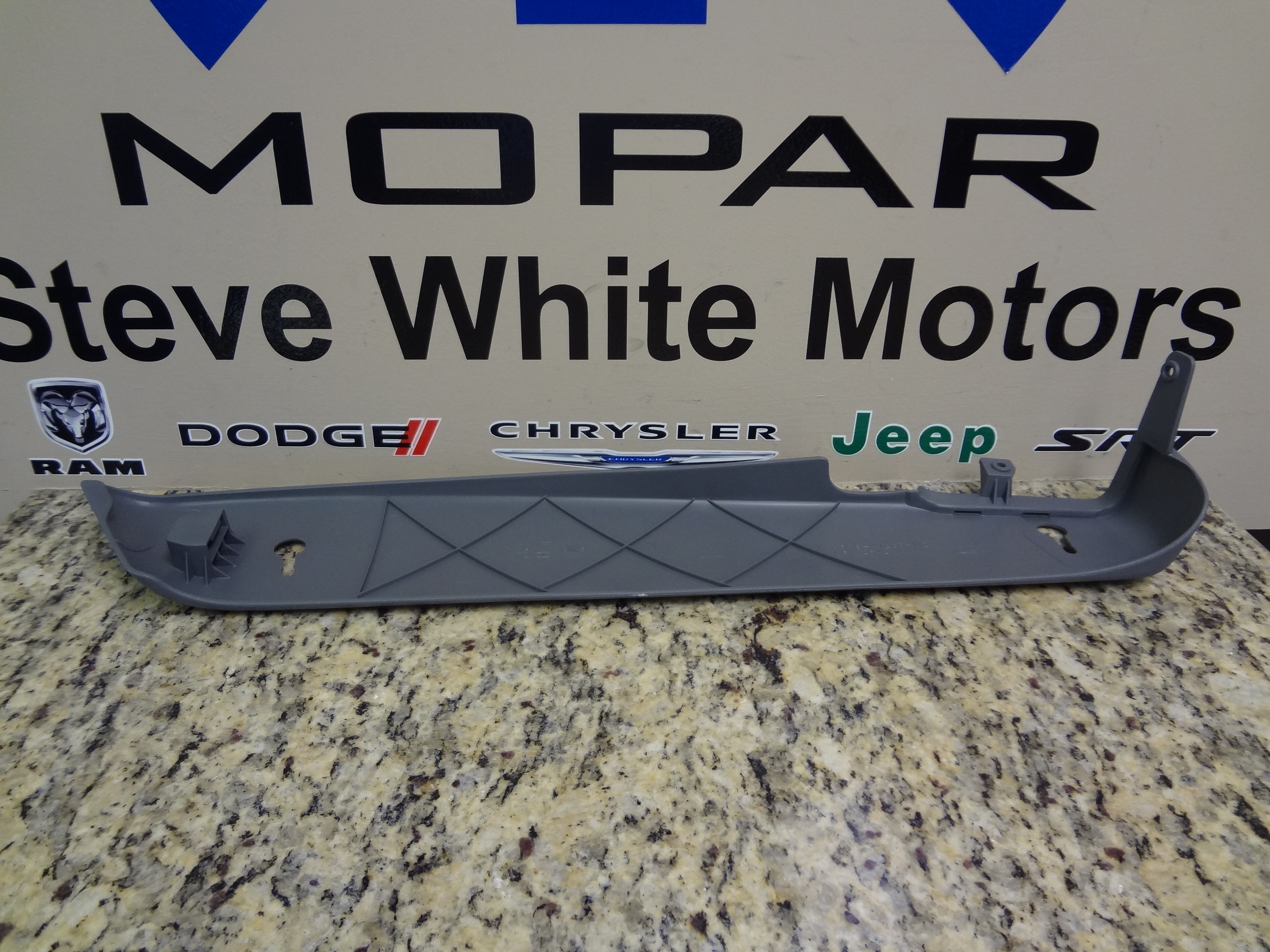 1AL891D5AA - Interior Trim: Seat Shield Side, Left, Lower for Chrysler: Town &amp; Country | Dodge: Caravan, Grand Caravan Image