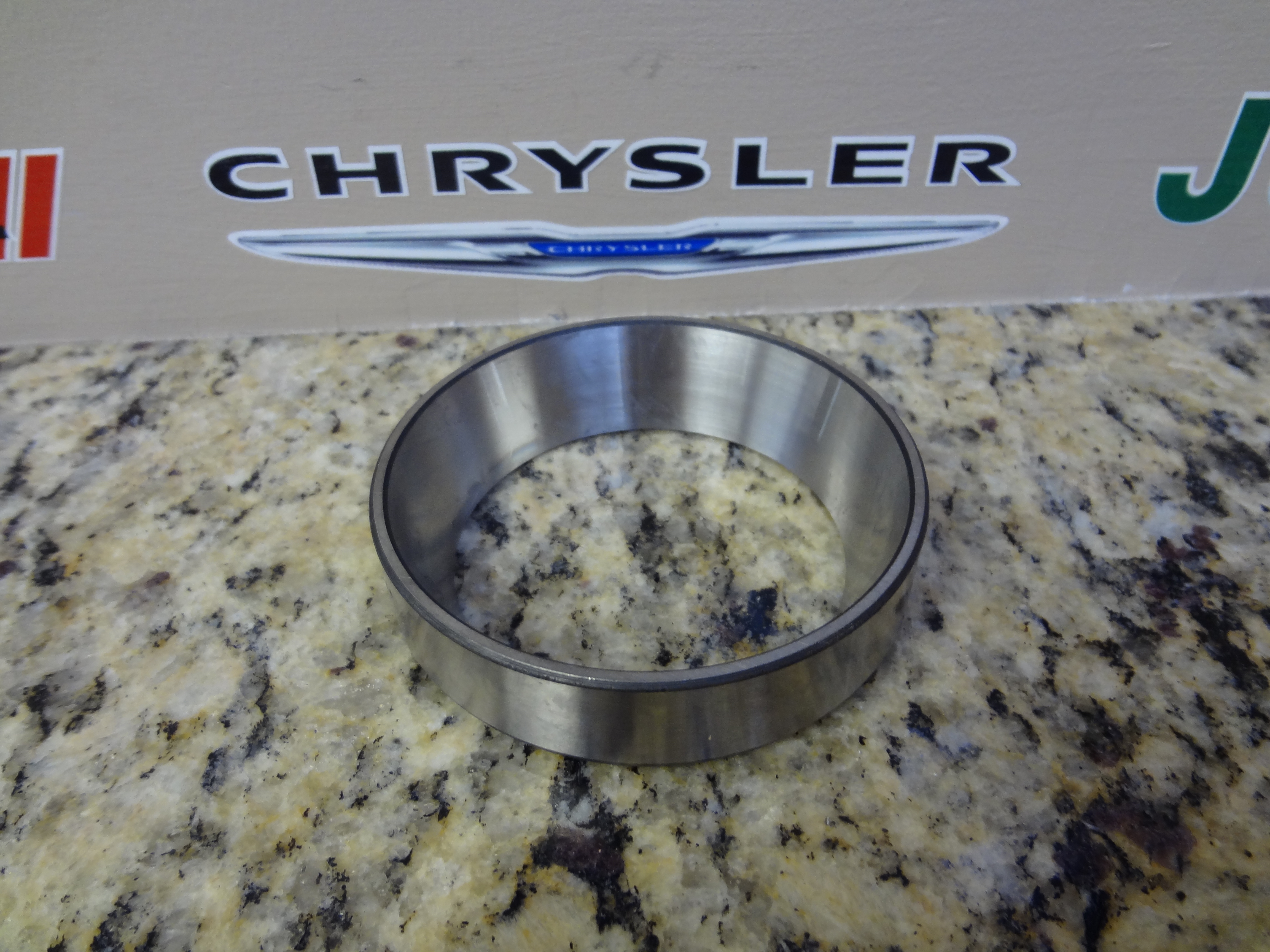 2800485 - Rear Axle: Pinion Bearing Cup, Rear for Chrysler: Aspen | Dodge: Dakota, Durango, Nitro | Jeep: Cherokee, Commander, Grand Cherokee, Liberty | Ram: Dakota Image