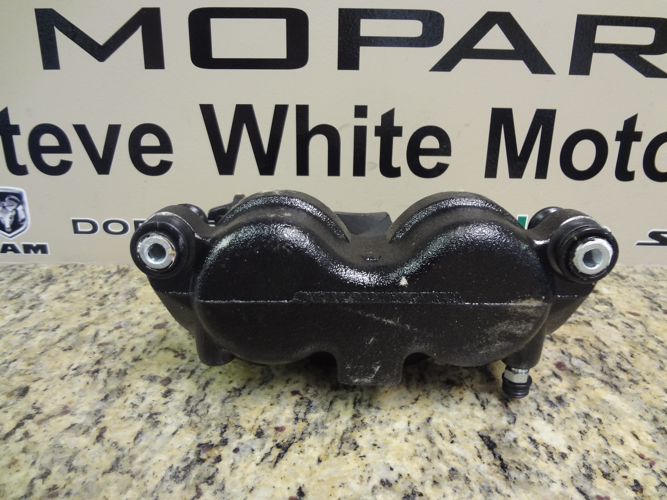 5093266AA - : Disc Brake Caliper Assembly, Right for Dodge: Ram 1500, Ram 2500, Ram 3500 Image