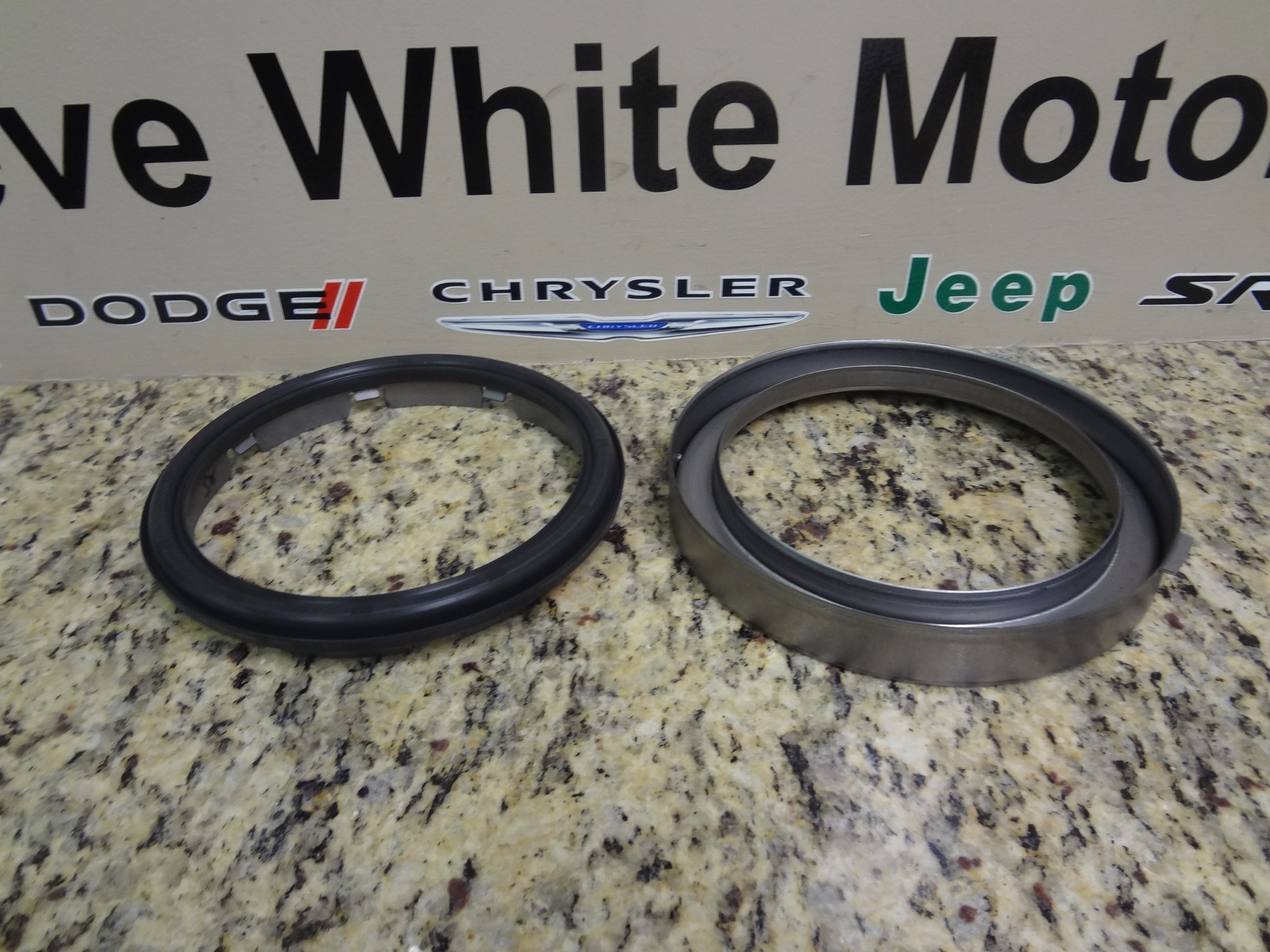 5102879AA - Automatic Transaxle 4 Speed: 2nd &amp; 4th Clutch Piston Retainer Package for Chrysler: 200, PT Cruiser, Sebring | Dodge: Avenger, Caravan, Journey, Neon, Stratus Image