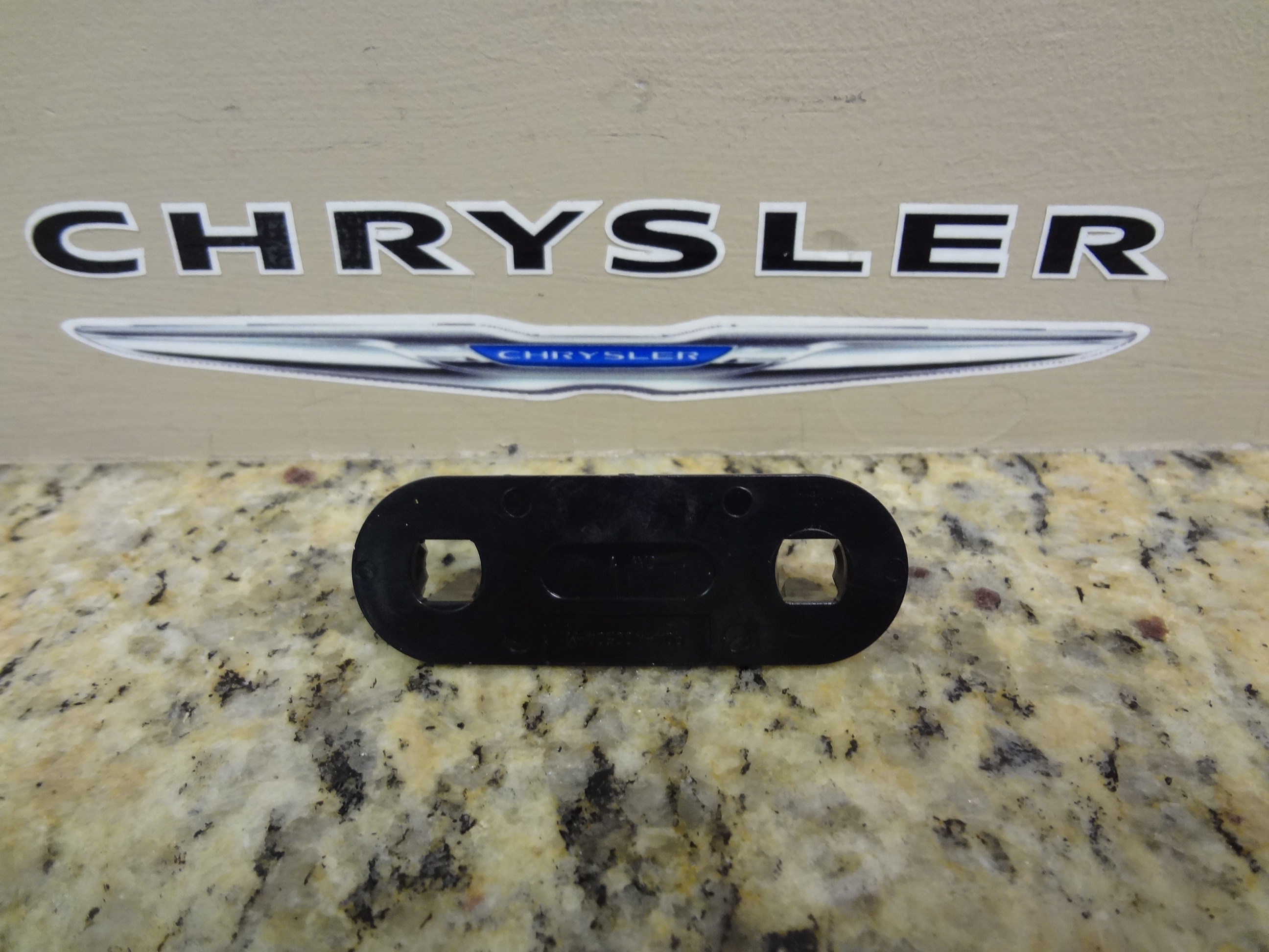 5143056AA - Body Sheet Metal Except Doors: Hood Latch Release Rod Retainer for Dodge: Dakota, Ram 1500, Ram 2500, Ram 3500 | Ram: Dakota Image