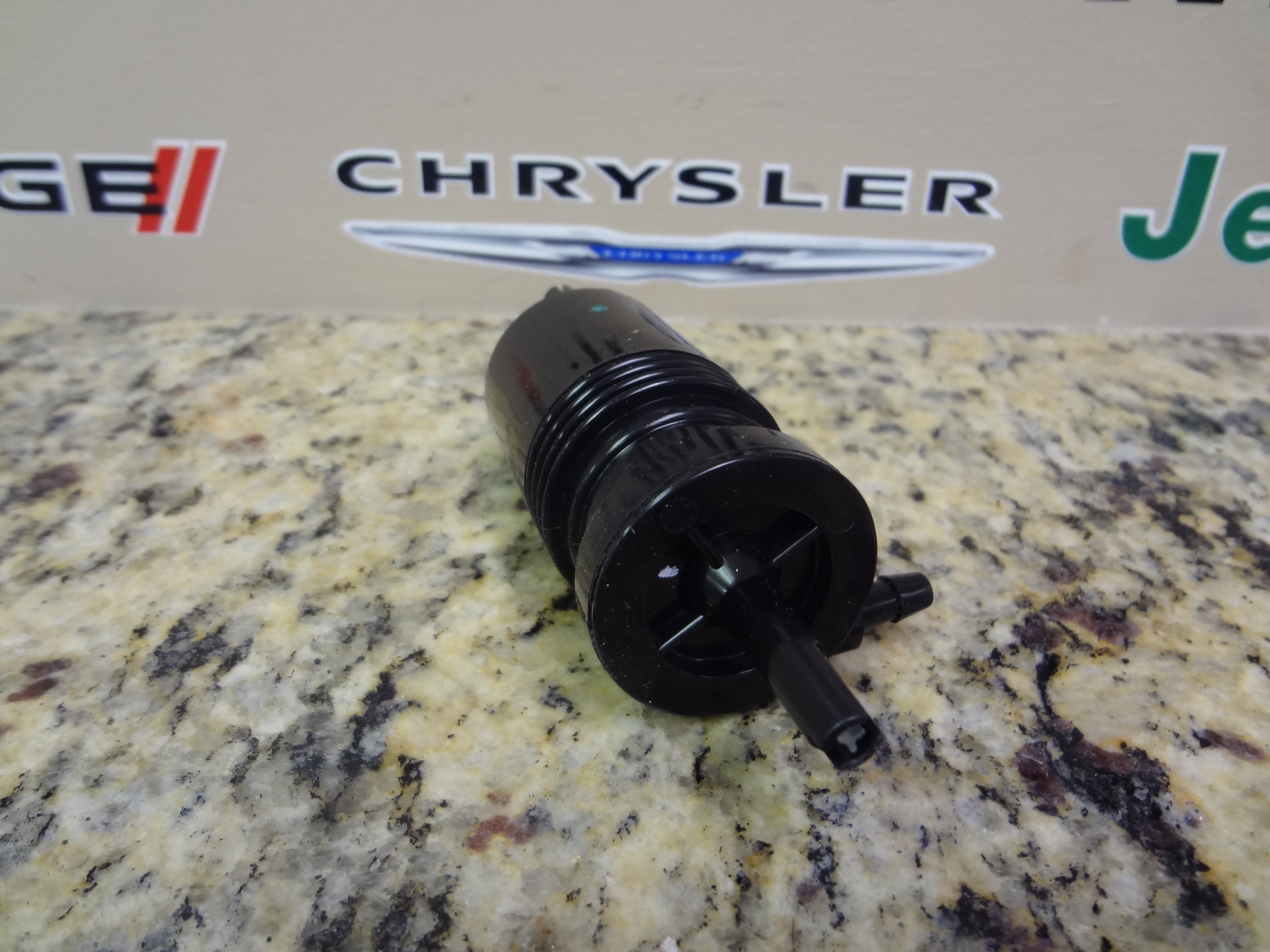 5152076AC - Electrical: Washer, Windshield Pump for Chrysler: 200, 300, Sebring | Dodge: Avenger, Ram 2500, Ram 3500 | Jeep: Wrangler, Wrangler JK | Ram: 2500, 3500 Image