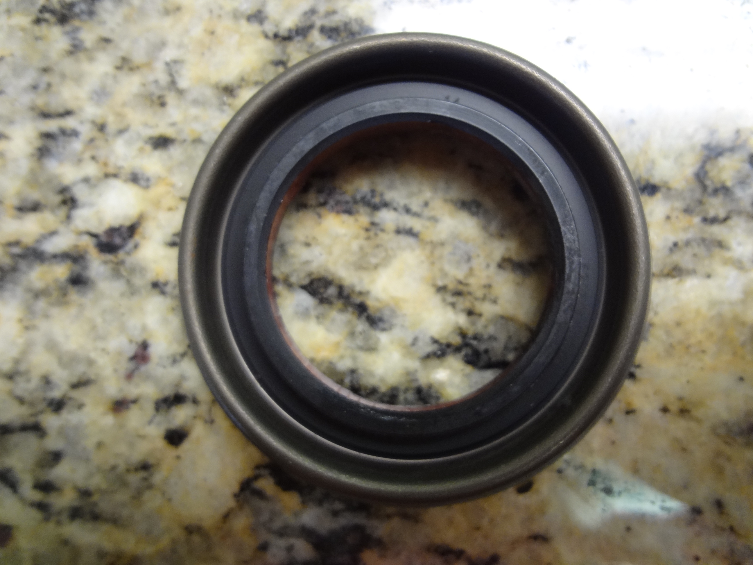 52070339AC - Rear Axle: Drive Pinion Seal for Chrysler: Aspen | Dodge: Dakota, Durango, Nitro | Jeep: Commander, Grand Cherokee, Liberty | Ram: Dakota Image