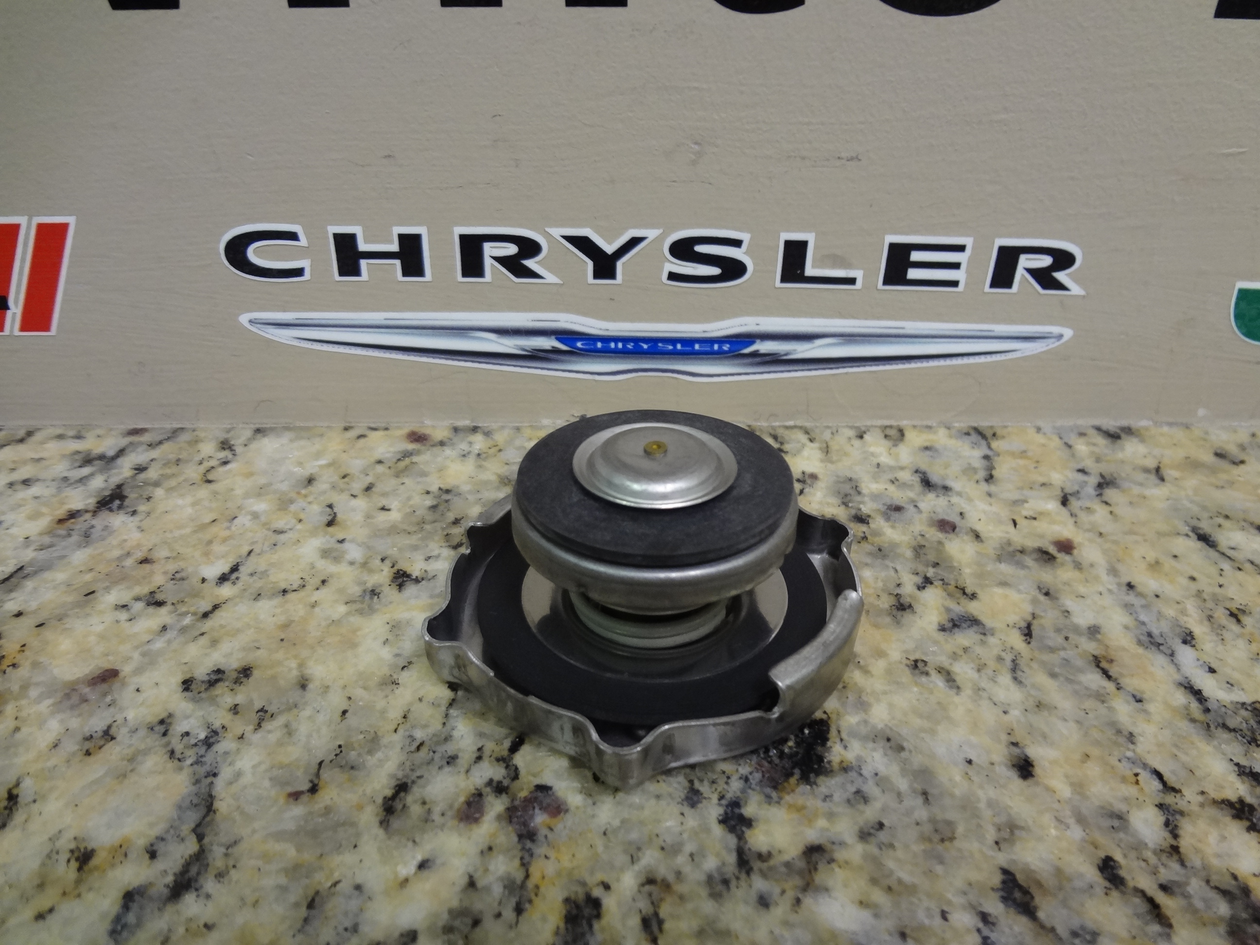 5278697AA - Cooling: Radiator Cap for Chrysler: 200, PT Cruiser, Town &amp; Country | Dodge: Avenger, Grand Caravan, Journey, Ram 1500, Ram 2500, Ram 3500 | Ram: C/V Image