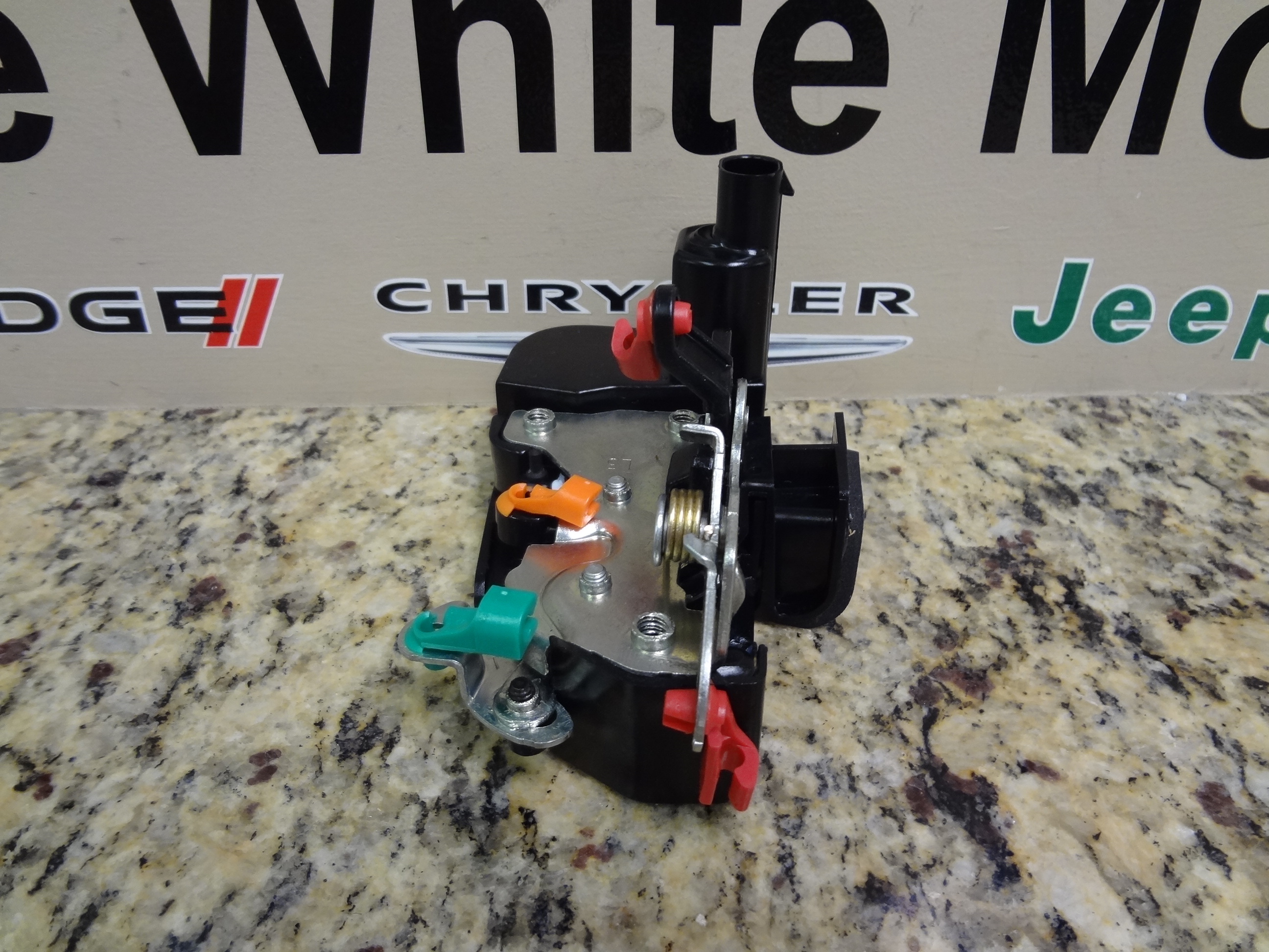 55076291AB - Doors and Related Parts: Front Door Latch, Left for Dodge: Ram 1500, Ram 2500, Ram 3500 Image