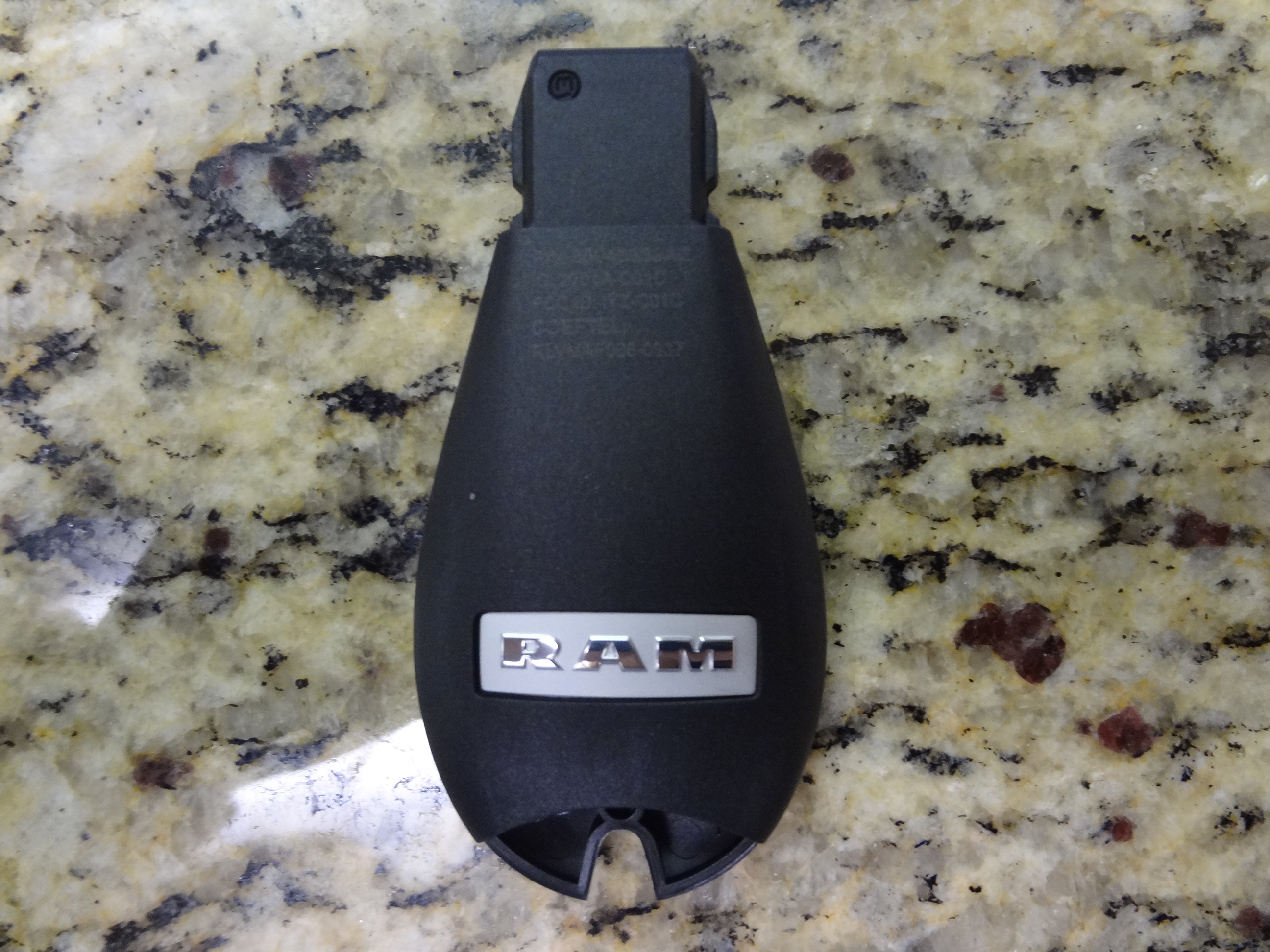 56046639AG - : Integrated Key Fob Transmitter for Ram: 1500, 2500, 3500 Image