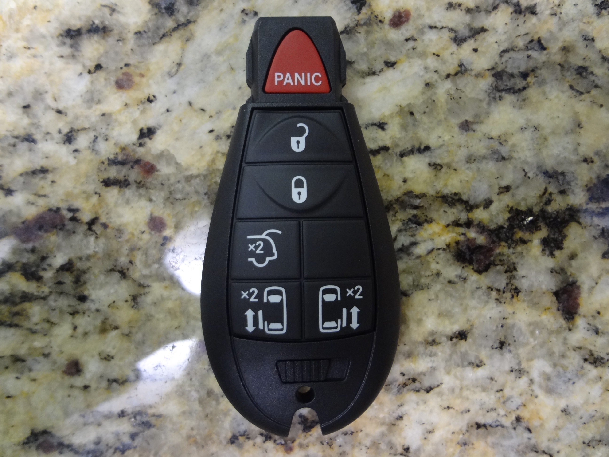 56046705AG - : Integrated Key Fob Transmitter for Dodge: Grand Caravan | Ram: C/V Image