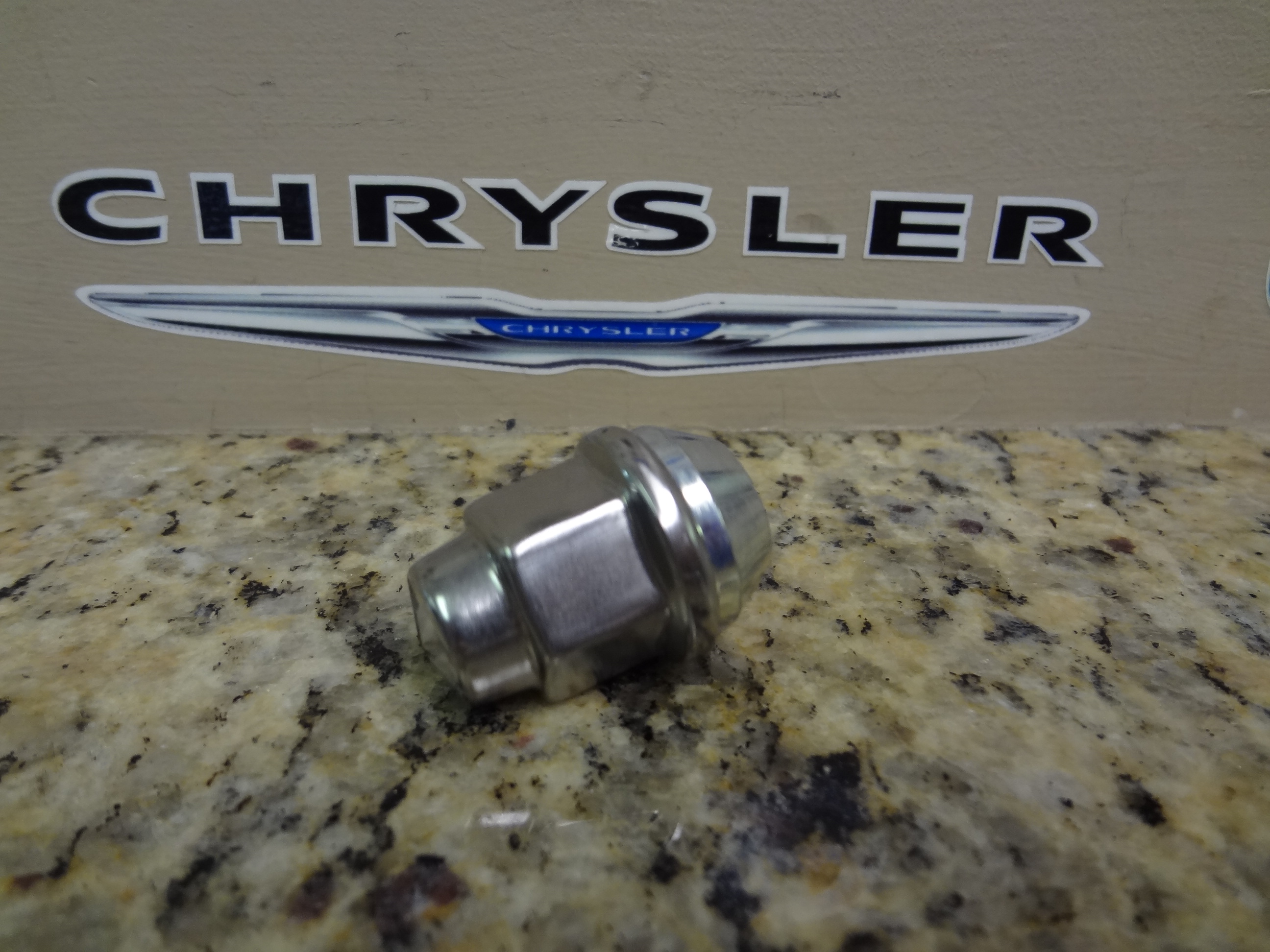 6036747AA - : Wheel Lug Nut for Dodge: Dakota, Durango, Nitro, Ram 1500, Viper | Jeep: Cherokee, Commander, Grand Cherokee, Liberty, Wrangler, Wrangler JK | SRT: Viper Image